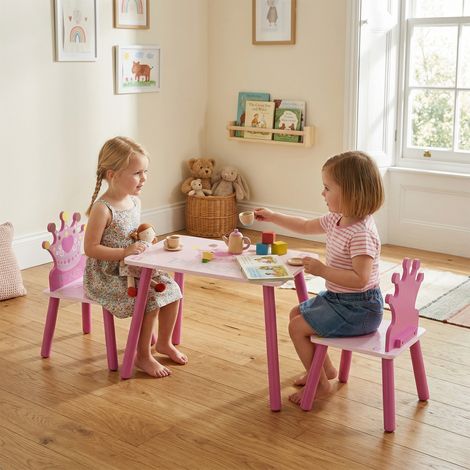 Ensemble table et 2 chaises sur le thème des princesses pour chambres d'enfants, en bois rose avec dossier en forme de couronne