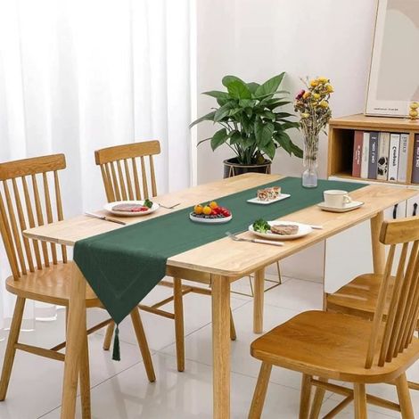 Chemin de table en lin vert uni 32 x 220 cm style contemporain avec pompons pour décoration de table (1/4)