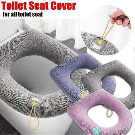 Housse de siège de toilette souple pour un confort optimal et une hygiène parfaite dans la salle de bain, coloris bleu marine. (1/4)