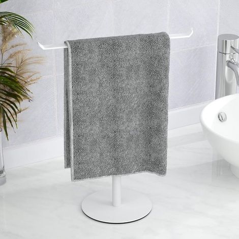 Porte-serviettes blanc à base ronde, 27 cm de large et 30 cm de haut, conçu pour le rangement sur le comptoir de la salle de bain. (1/5)