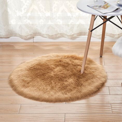 Tapis rond en peluche de couleur unie
