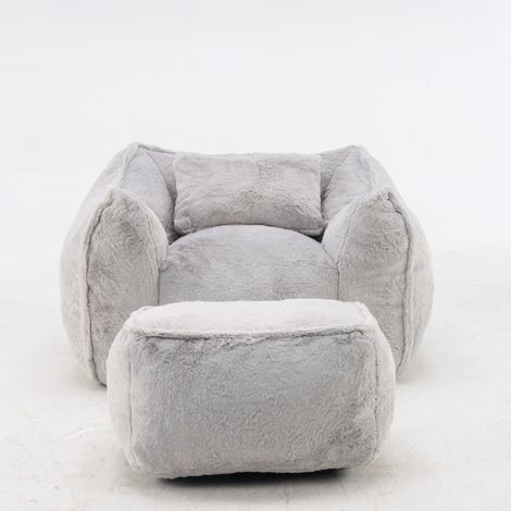 Poltrona puff gigante con poggiapiedi e cuscino in pelliccia sintetica grigia 123 x 97 x 73 cm (1/5)