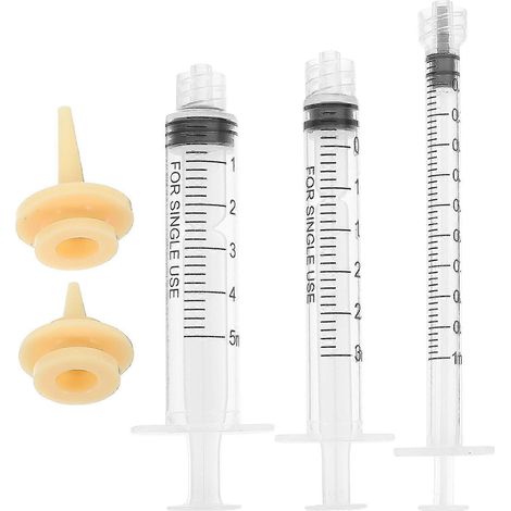 Un ensemble de sucettes pour animaux de compagnie, des sucettes pour nourrir et apaiser les animaux, des tubes d'alimentation pour chatons et des tétines pour chiots. (1/5)