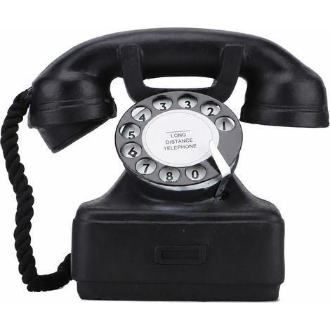 Teléfono fijo antiguo de estilo retro, objeto decorativo para la oficina o como accesorio para fotos. (1/5)