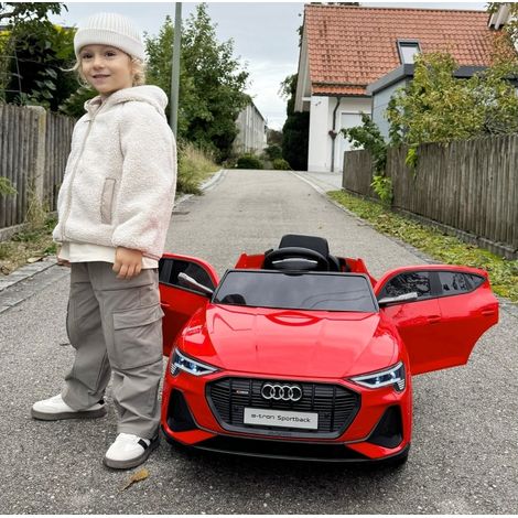 Auto elettrica per bambini con telecomando rossa OKMYHOME (1/3)