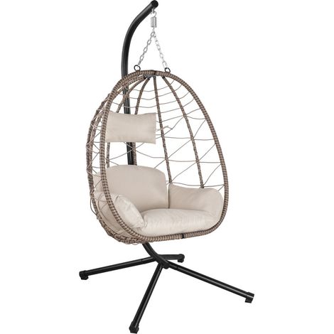 Sedia pensile in vimini Aria con struttura inclusa   Beige  Sedia pensile pieghevole con struttura in vimini, cuscino e sospensione con molla (1/3)