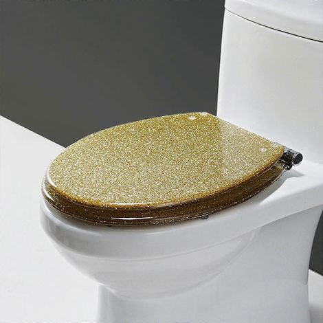 Abattant de toilette en résine pailletée, rond ou ovale, fermeture douce, finition dorée, installation facile pour la rénovation de votre salle de bain. (1/5)