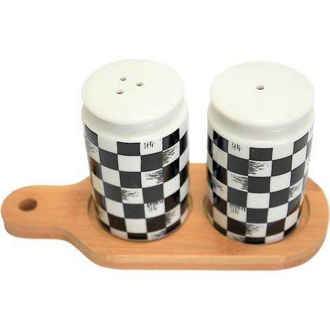 Elegante juego de salero y pimentero con base de bambú. (1/4)