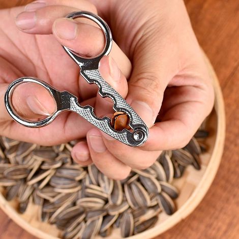 Outil multifonction en acier inoxydable pour casser les graines de tournesol et les noix, accessoire de cuisine pour la maison (1/4)