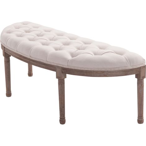 Banc demi-lune Chesterfield, piètement bois et tissu beige, 140,5x51x48 cm, repose-pieds d'entrée élégant, mobilier salon chic, assise rembourrée capitonnée, finition cognac clair. (1/5)