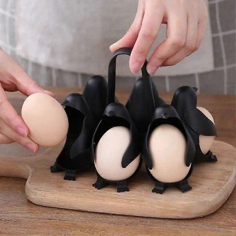 This 3-in-1 egg rack can be used for cooking, storing, and holding eggs. The penguin-shaped egg cooker can make soft-boiled or hard-boiled eggs and ho (1/4)
