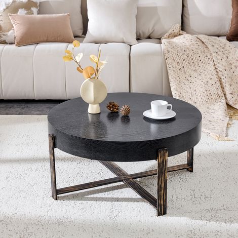 Table basse ronde Ø 68 cm style rétro industriel, plateau MDF effet bois noir, structure croisée en métal finition bronze antique, adaptée style wabi-sabi / industriel