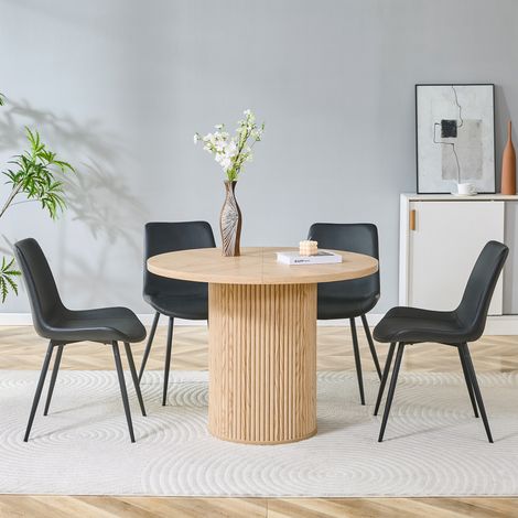Table ronde MDF 100cm bois clair avec 4 chaises imitation cuir noir, ensemble élégant et fonctionnel pour la maison (1/5)