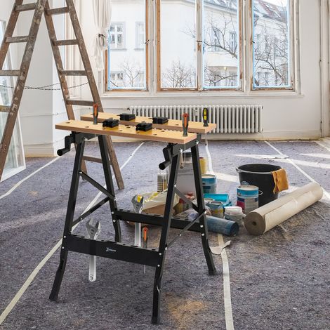 Établi pliant portable avec 4 trous pour serre-joints et scie, pour la menuiserie à domicile. Structure en fer et MDF, supporte jusqu'à 70 kg, dimensions : 56 x 62 x 75 cm, noir naturel.