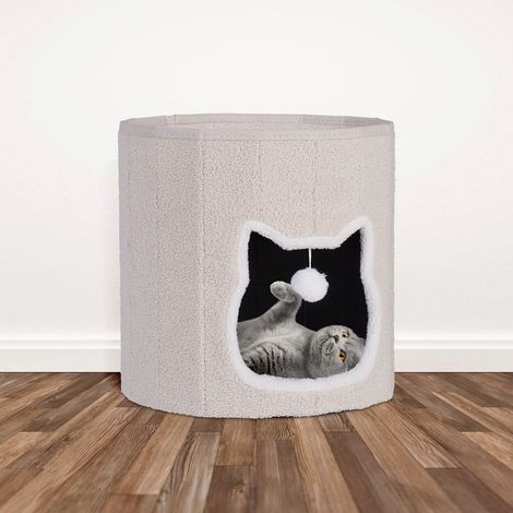 Faltbare beige katzenhohle mit kissen und spielzeug