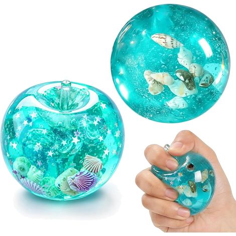 Set mit 2 Squishies: Apfel und Kokosöl. Dekorative Schreibtischaccessoires, handgefertigt aus Muscheln (Kugel und Apfel). Ideal für Zuhause und Büro. (1/5)