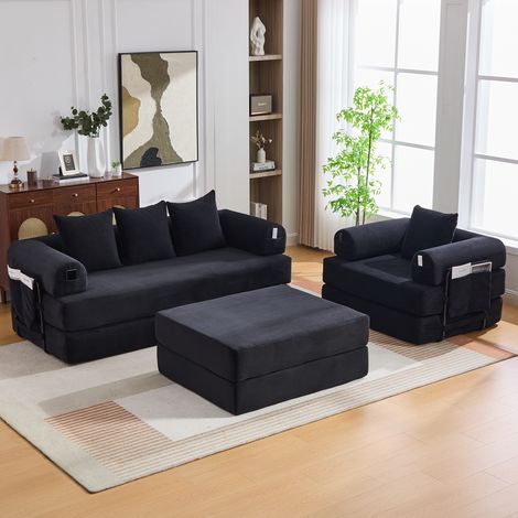 Canapé modular 4 plazas de pana negro con puf, estructura metálica y bolsillo lateral