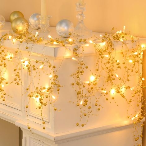Guirlande de Noël lumineuse – 1.5 m, 10 LED, baies décoratives Or – Idéale pour sapin, cheminée, porte et table – Décoration intérieure et extérieure (1/5)