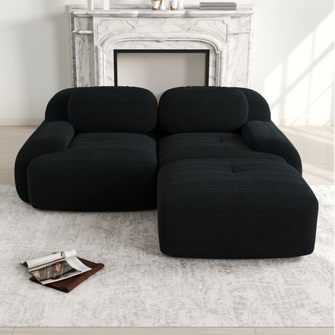 Canapé d’angle modulaire en tissu de pana negro, sin montaje, con reposabrazos curvos