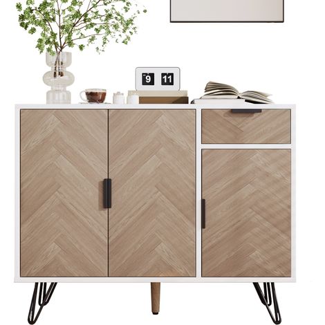 Armoire moderne pour l’entrepossession des objets domestiques. Elle est décorée dans les couleurs blanc et bois.  ( dimensions : 90 x 30 x 71,5 cm).