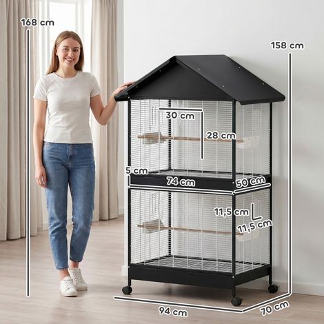 Grande cage à oiseaux avec séparation amovible, double porte, 2 perchoirs bois, roulettes, 2 bacs, 4 distributeurs XXL pour volière spacieuse. (1/5)