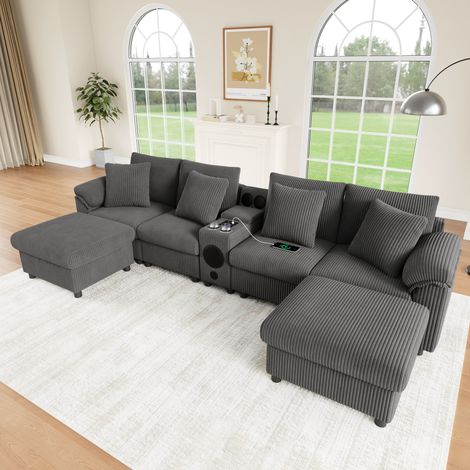 Sofá modular 315,5x144 cm gris de pana con consola multimedia, Bluetooth, carga inalámbrica y poufs (1/5)