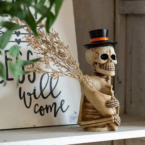 Totenkopfförmiger Stiftehalter, blumenförmiger Schlüsselanhänger, Make-up-Pinselhalter, Büro- und Wohnaccessoires.