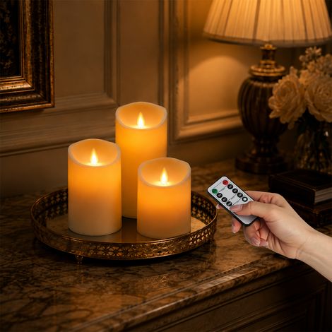TolleTour LED Kerzen Stumpenkerzen 3er Set aus Kunststoff 15 / 12,5 / 10 cm - mit Fernbedienung Timer dimmbar beweglicher Flamme warmweiß Elfenbein (1/5)