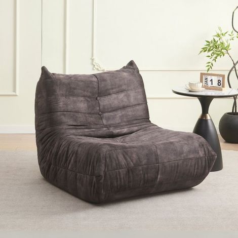 Poltrona in morbida schiuma e rivestita in tessuto grigio scuro Horace – Comfort e relax in ogni ambiente