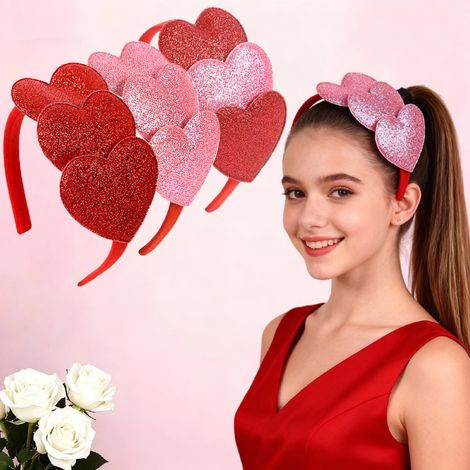 Tres diademas con forma de corazón para el Día de San Valentín: una diadema roja brillante con forma de corazón y una diadema rosa color melocotón con forma de corazón y un clip. (1/2)