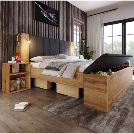 Lit double moderne 180x200 cm aspect chêne avec tête de lit rabattable en lin, chevets, banquette coffre, lampes USB et sommier (1/5)