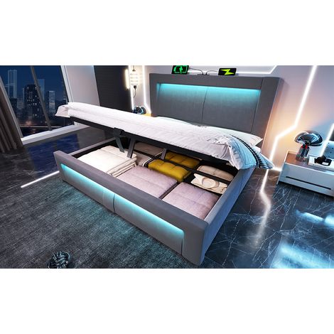 Cama 140x200 cm tapizada en terciopelo gris, con almacenaje, LED, USB y cabecero curvo, con colchón (1/5)