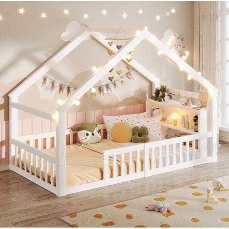 Letto per bambini 90x190 cm a forma di casa, con sponde di sicurezza, ripiani laterali, legno di pino, bianco (1/5)