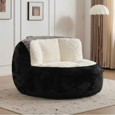 Sillón puff grande de pelo sintético con relleno de espuma negro blanco gris (1/5)