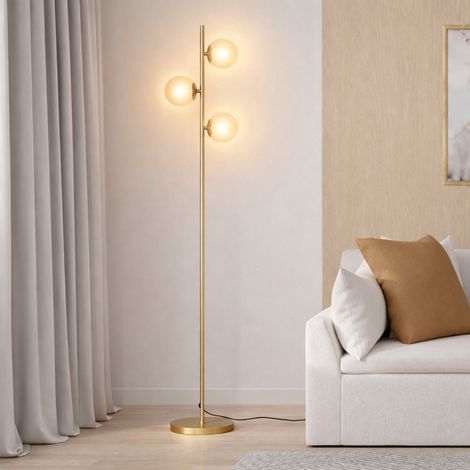 Lámpara de pie de metal dorado con 3 pantallas globo de cristal