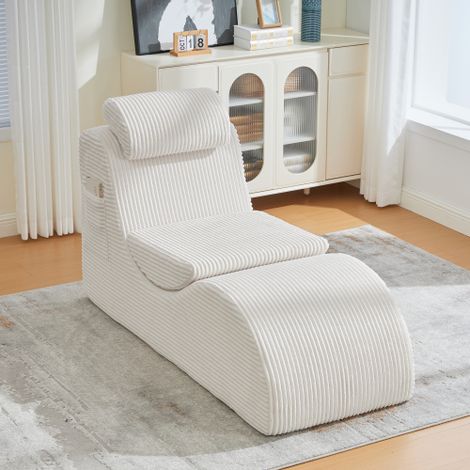 Un fauteuil de détente au style moderne, doté d'un design ergonomique unique et garni d'une mousse haute résilience à haute densité. Il est équipé d'un coussin d'assise amovible et d'une poche de rang