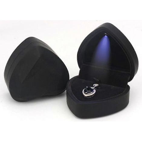Ce coffret à bijoux illuminé par des LED est fabriqué en velours élégant. (1/5)