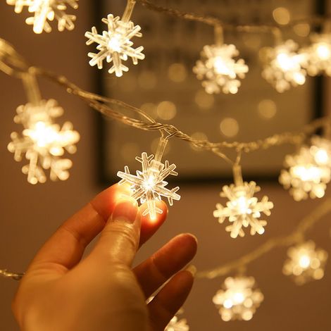 Batteriebetriebene Lichterkette mit Schneeflockenmotiv, 6 m, 40 LEDs, mit Fernbedienung, 8 Modi, wasserdicht, für drinnen und draußen, geeignet für Partyräume, Balkone und DIY-Dekorationen (Warmweiß)  (1/3)