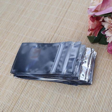 50 sachets refermables en aluminium argenté (8,5 x 14 cm), transparents et étanches. (1/4)