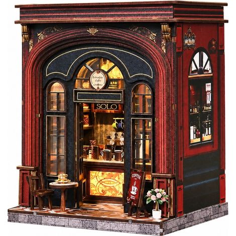 Kit de serre-livres en bois à monter soi-même, représentant une maison de café, lumière chaude, construction artisanale. (1/4)