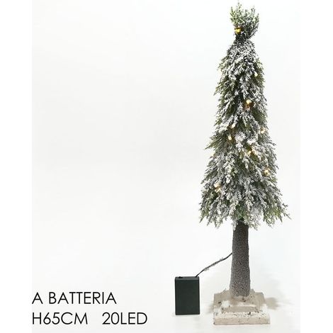 Albero di natale innevato con luci stilizzato da decorazioni natalizie vetrina negozi (1/5)