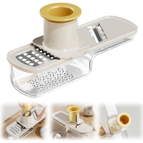 Este molinillo de jengibre y ajo 3 en 1 para la cocina incluye un rallador compacto con protector de manos y cuchillas de acero inoxidable. (1/5)