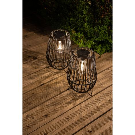 Lanterne solaire à poser imitation rotin – lumière chaude et design ajouré pour une ambiance cosy (1/4)