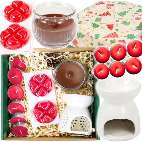 Un set di candele profumate e lumini in una confezione regalo per un'occasione speciale. (1/5)