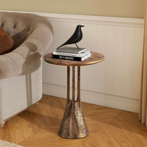 Table d'appoint ronde en bronze avec style vintage et surface texturée, design artistique pour la décoration intérieure (1/5)