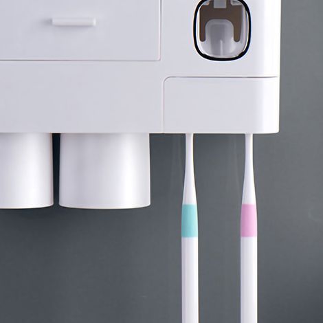 Support de rangement pour brosses à dents magnétiques inversées, avec presse-tube de dentifrice et 2 gobelets bleus. (1/5)