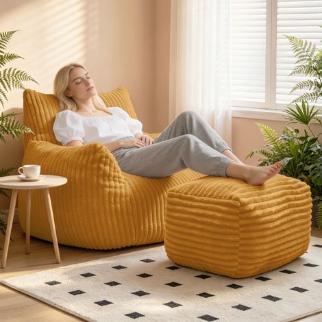Fauteuil long incurvé avec repose-pieds assorti pour une assise profilée et une harmonie intégrée avec la décoration intérieure (1/4)