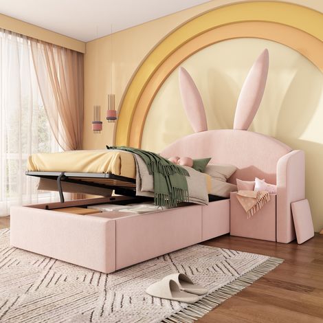 Lit enfant rembourré, 90x190 cm, lit coffre avec rangement hydraulique et table de chevet, velours doux design oreilles de lapin, Rose