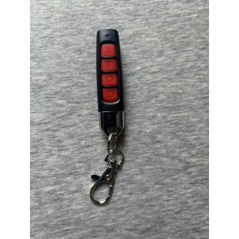 Mando a distancia de 433 MHz para puertas de garaje enrollables, color negro, con botón de flecha roja.