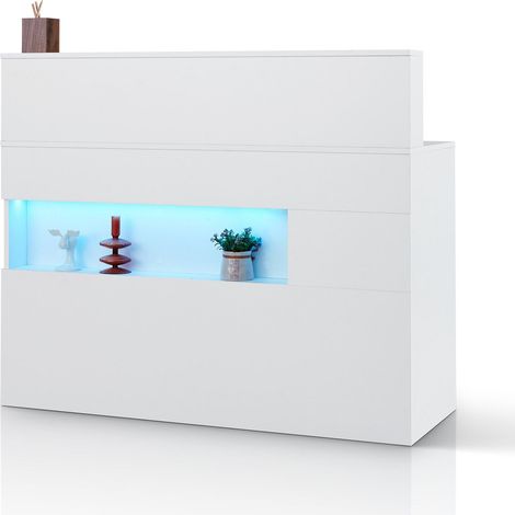 Comptoir d'accueil rectangulaire blanc, dimensions : 120 x 48 x 100 cm. Éclairage LED, 2 tiroirs et prises électriques. Idéal pour caisse, hall d'accueil, salon de beauté et bureau. (1/5)